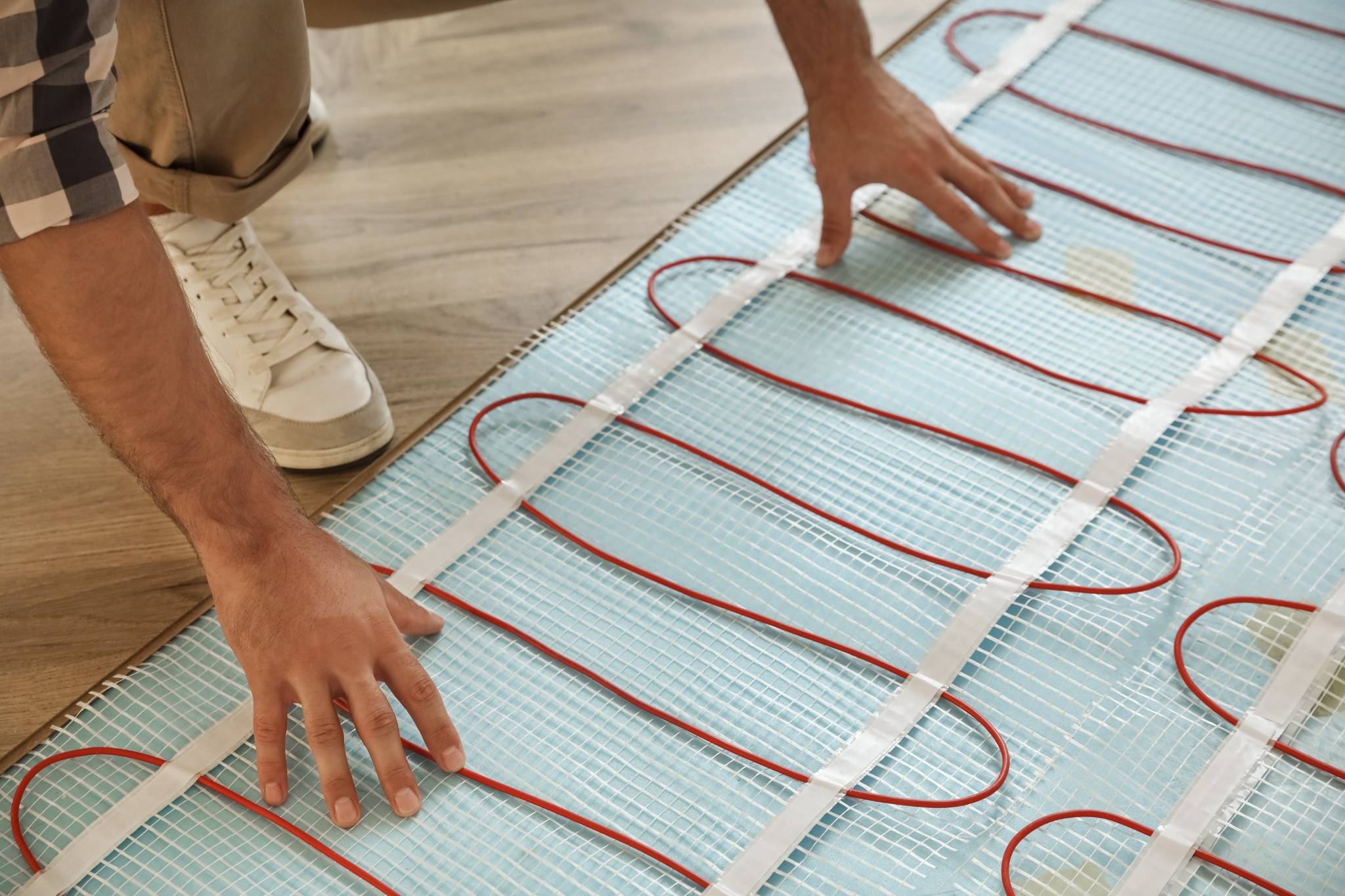 Installation d’un plancher chauffant électrique sous un revêtement de sol